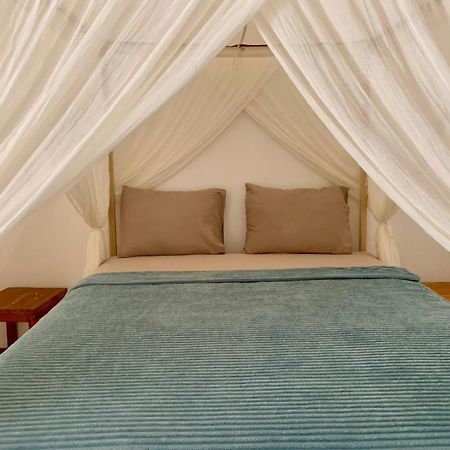 The Village Rua Beach Homestay Exterior foto