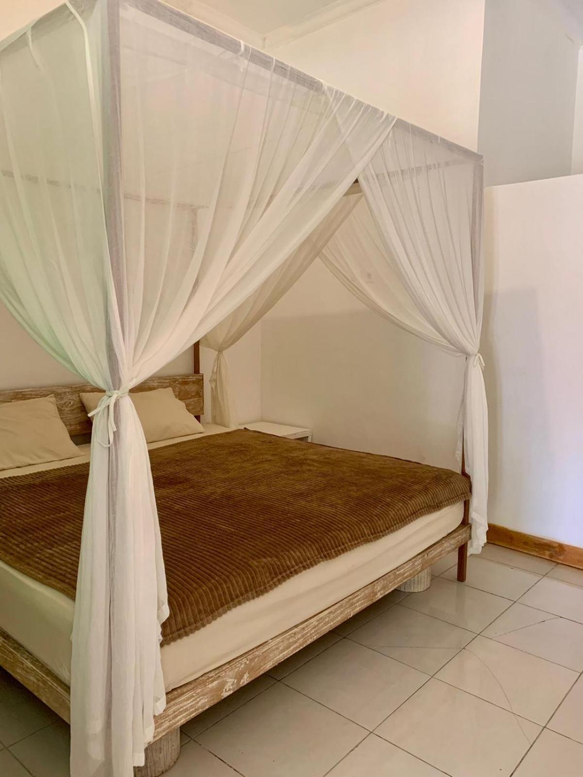 The Village Rua Beach Homestay Exterior foto